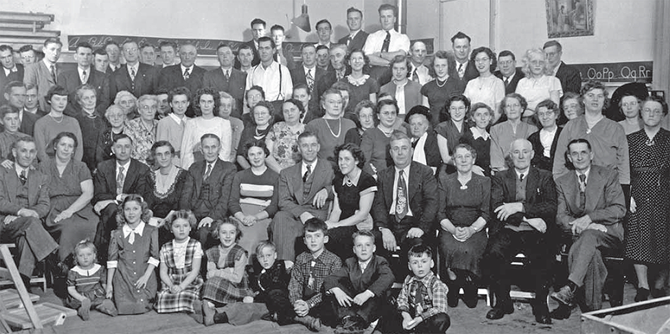Group photo at school house from when Reeve Ivor Wever became Lambton County Warden.