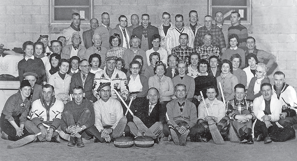 A large group of people who made up the Watford Curling Club 1961. 