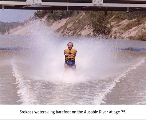 Charlie Srokosz water skiing. Image Caption:"Srokosz waterskiing barefoot on the Ausable River at age 75!"