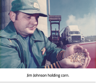 Jim Johnson, holding corn.