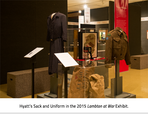 Photo of Hayatt's sack and uniform on display, Link.