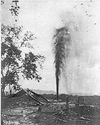 Black and white image of shooting a well using a torpedo.