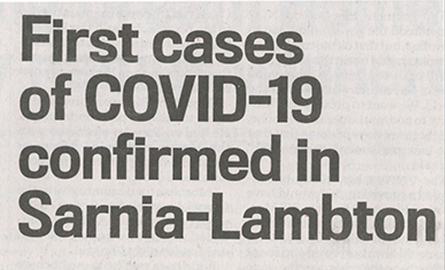 Photo of newspaper text "First cases of COVID-19 confirmed in Sarnia-Lambton