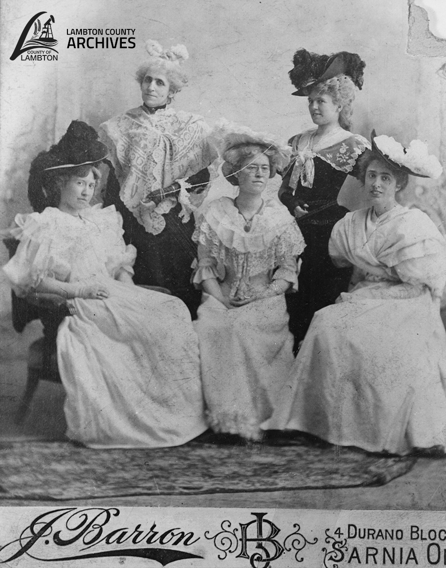 black and white photos of ladies in dresses and hats