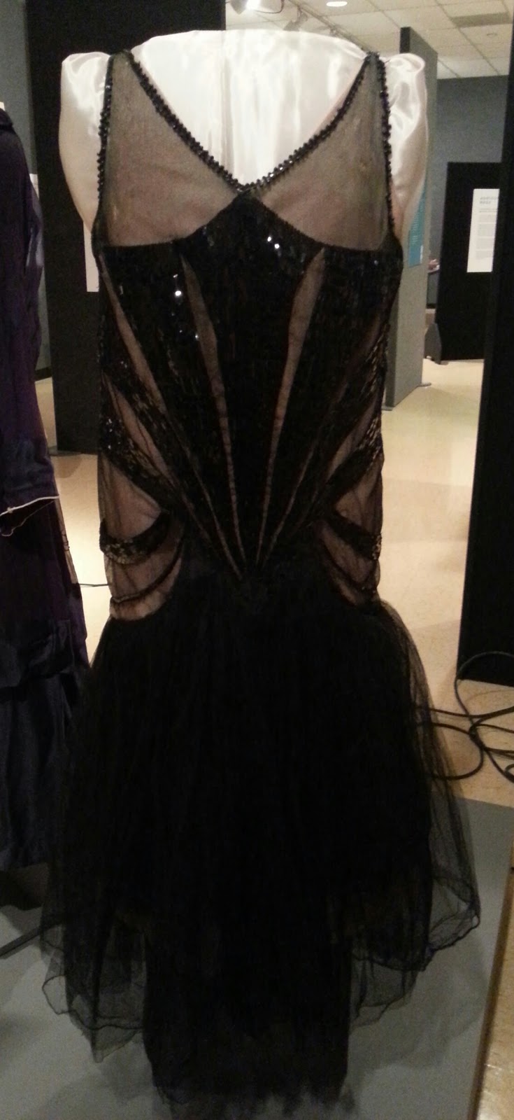 Black dress on a mannequin.