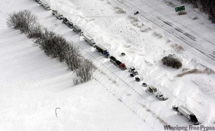 Ariel view of a highway in the snowstorm.
