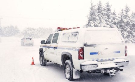 Emergency vehicle in a snowstorm.