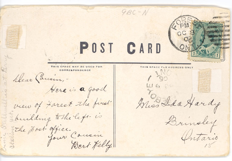 Back of a post card with writing.