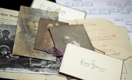 Archives documents and images on a table.