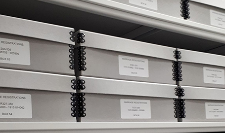 Boxes on the Archives' shelf.