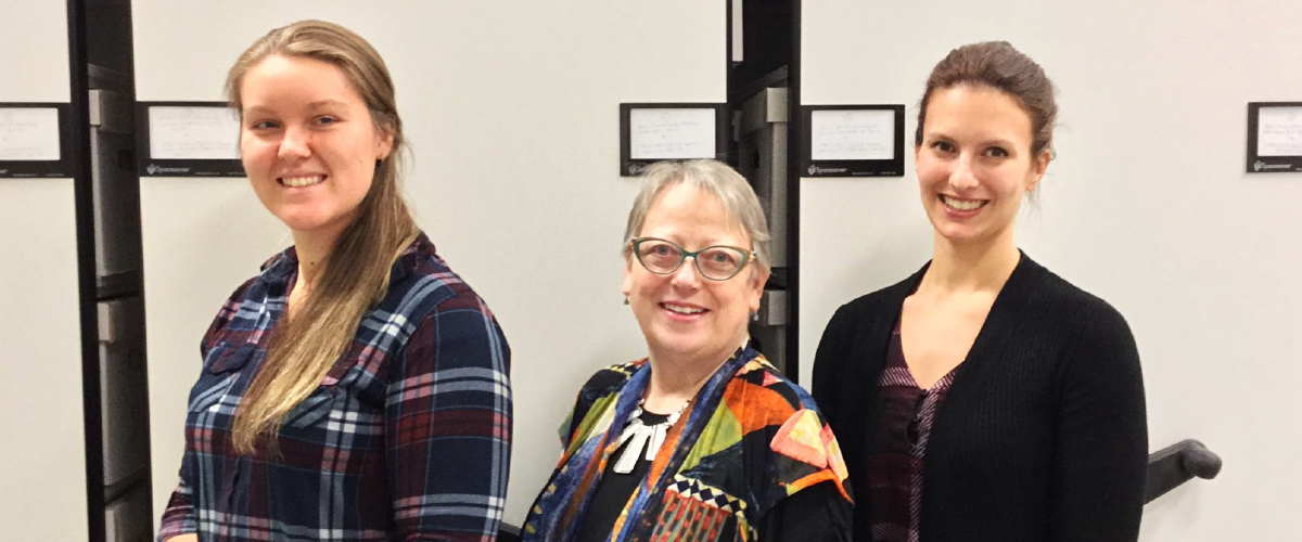 Staff members in the Archive's vault. 