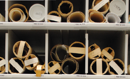 Items in Lambton County Archives' collection laying on a shelf.