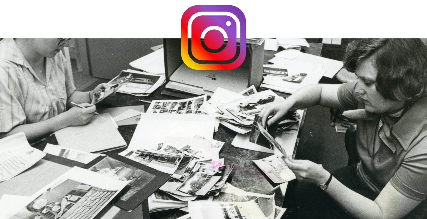Two women sorting through photos at the Lambton County Archives with the Instagram logo .