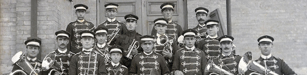 Black and white photo of a concert band.