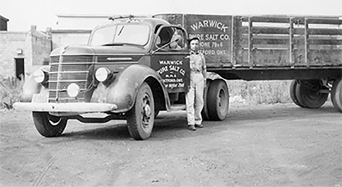 Bill Goldhawk beside Elarton Salt Works truck, c. 1945. 