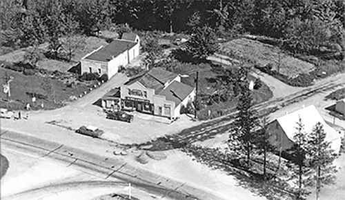 Aerial view of Blain’s Corners, a grocery store, egg grading station, and locker service. 