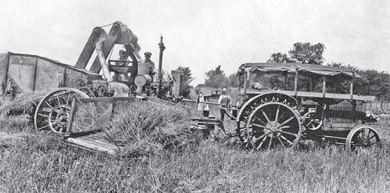 Ernest Albert Edwards' combine in the field.