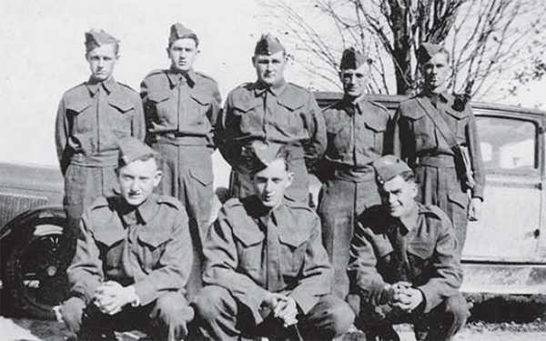 A small group of men in uniform.