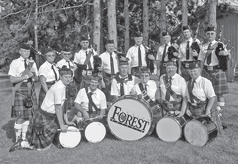 Forest Pipe Band all in kilts and hats.