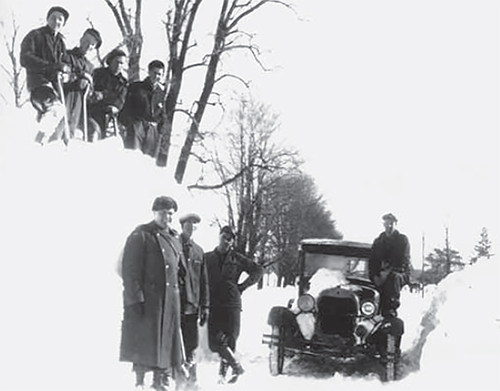 Men clearing the road during the winter.