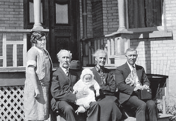 Anna Cook and L.S. Cook with McKenzie's who hold baby Jean Cook.