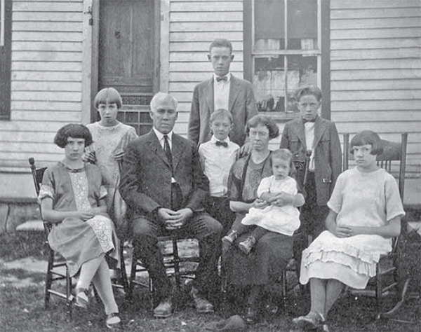 Charles Nadab with his wife and 7 children.