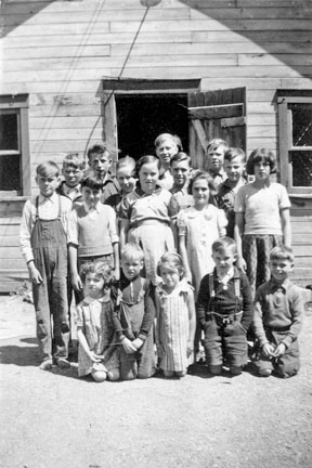 A group of school children.