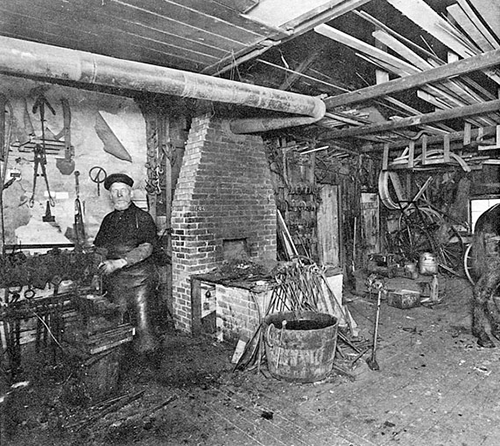 Joshua Sanders in his blacksmith shop.