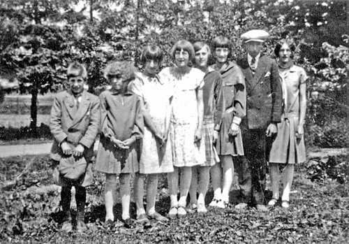 Wambaugh family standing outside.