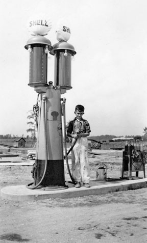 David Wilson at first gas pumps at Wilson’s Shell Station