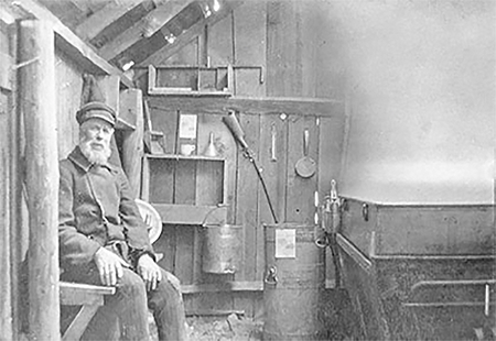 John Young Williams in sugar shanty.