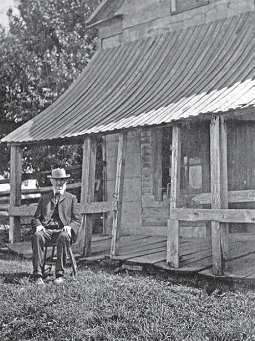 William Saunders in front of Temperance Hotel, Saunders' Corners.