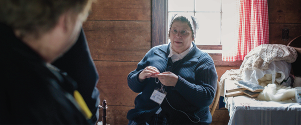 An actor playing a pioneer for an educational program.