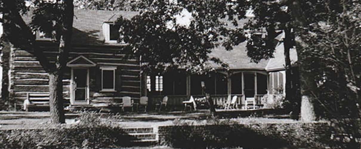 Black and white photo of a cabin.