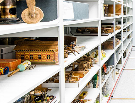 Shelving in the collections centre displaying museum artifacts.