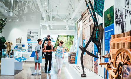 A family walks through the new Lambton Gallery.