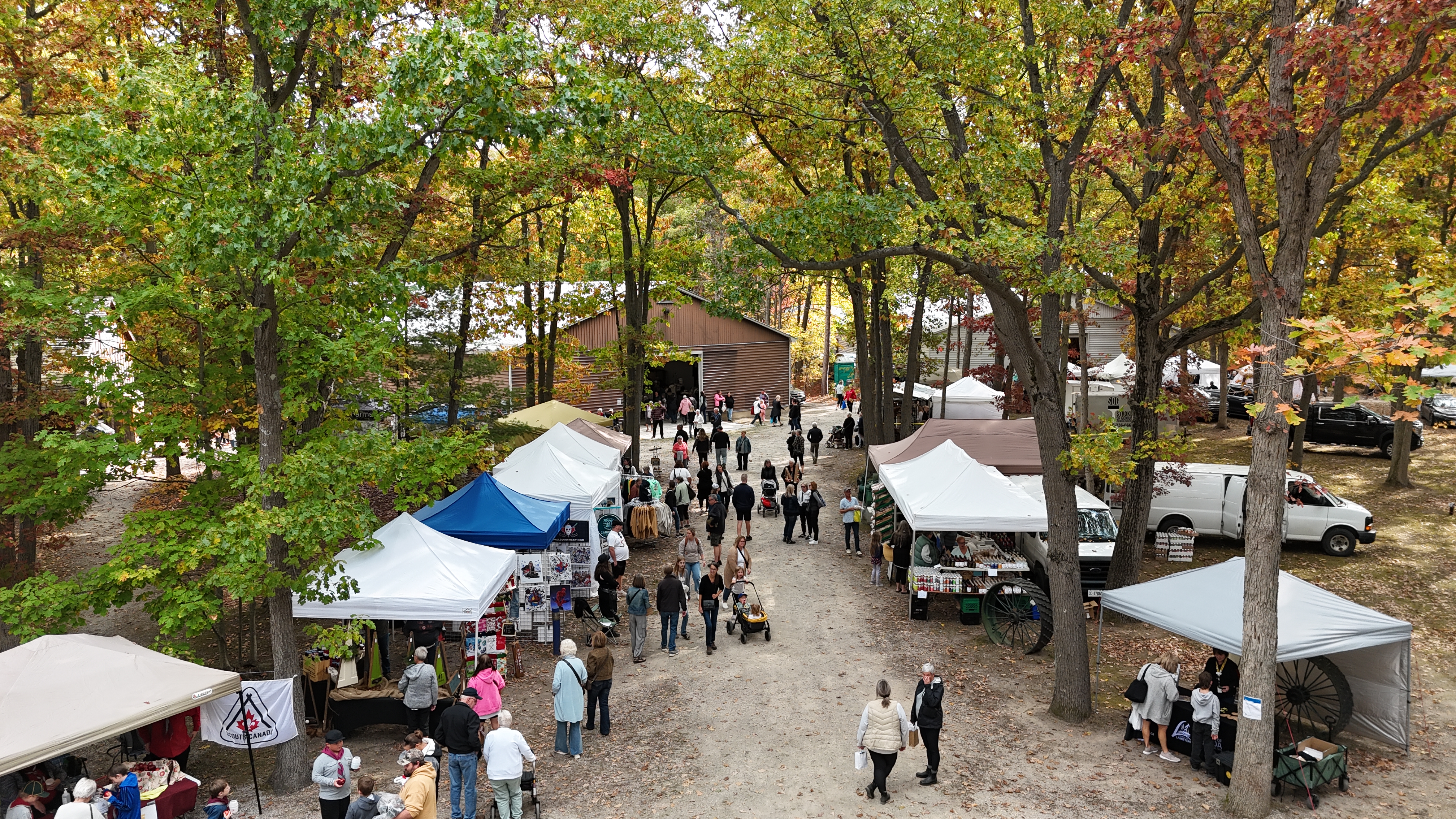 Aerial view of visitors admiring various vendor tents at the Lambton Fall Colour & Craft Festival in 2025.