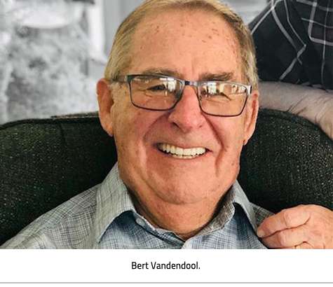 Bert Vandendool sitting in a comfy chair smiling. Image Caption: Bert Vandendool 