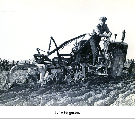 Jerry Ferguson on plow, plowing a field. Image Caption: Jerry Ferguson