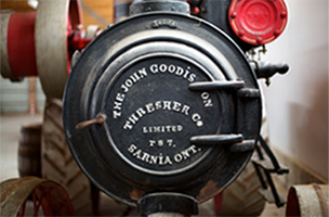 Close up of the front of the steam engine. Text reads ``John Goodison Thresher Co Limited T87 Sarnia Ont.
