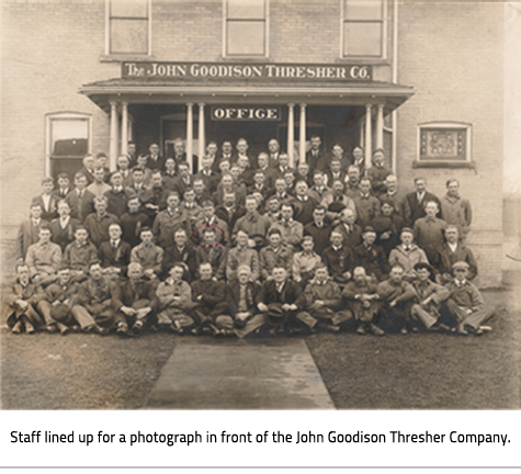 (Image Caption: "Staff lined up for a photograph in front of the John Goodison Thresher Company."), link