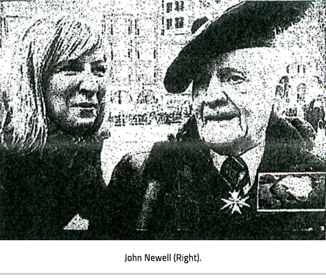 Photo of a women and John Newell in uniform, Link.