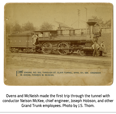(Old train with four men, on or around the train. Text reads"First engine, NO. 253, through St. Clair Tunnel, April 9th, 1891, Engineer W. Owens, Firemen W. McNeish". Image Caption: "Ovens and McNeish made the first trip through the tunnel with conductor Nelson McKee, chief engineer, Joseph Hobson, and other Grand Trunk employees. Photo by J.S. Thom."), link.