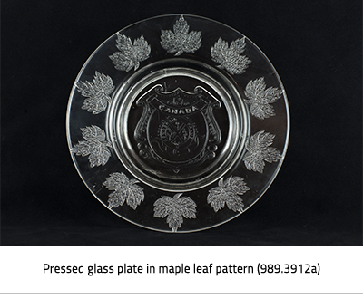 Pressed glass plate with maple leaves. Image Caption: "Pressed glass plate in maple leaf pattern(989.3912a)"), link.