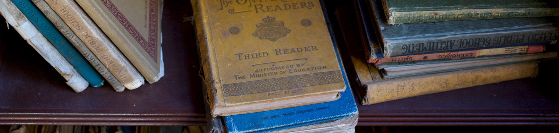 Old books on a shelf.