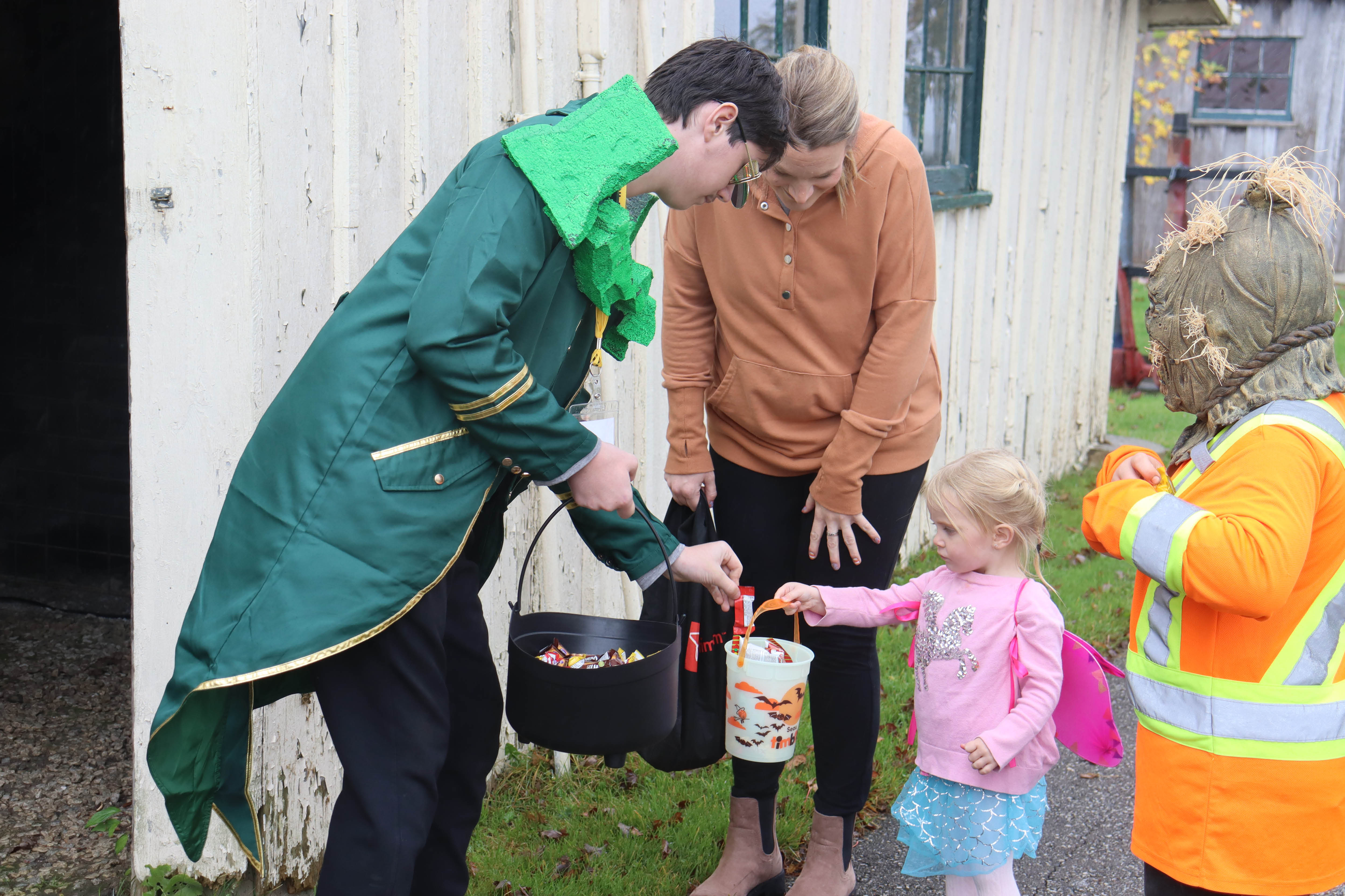 Costumed children trick or treat in the Canadian Pole Drilling Rig in 2023
