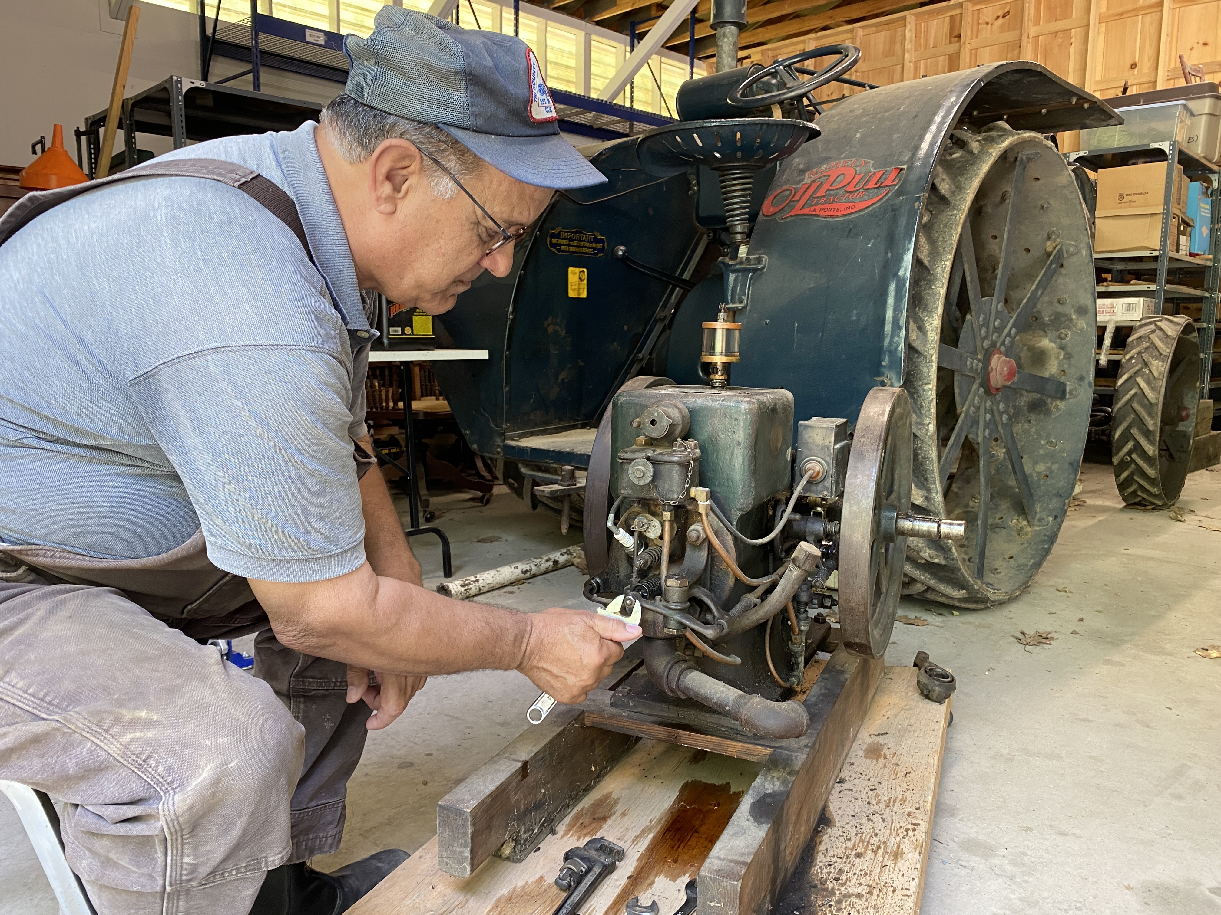 Museum staff tune up a demonstration gas engine that will be on display at Lambton Heritage Museum Bygone Days Bash on July 4.