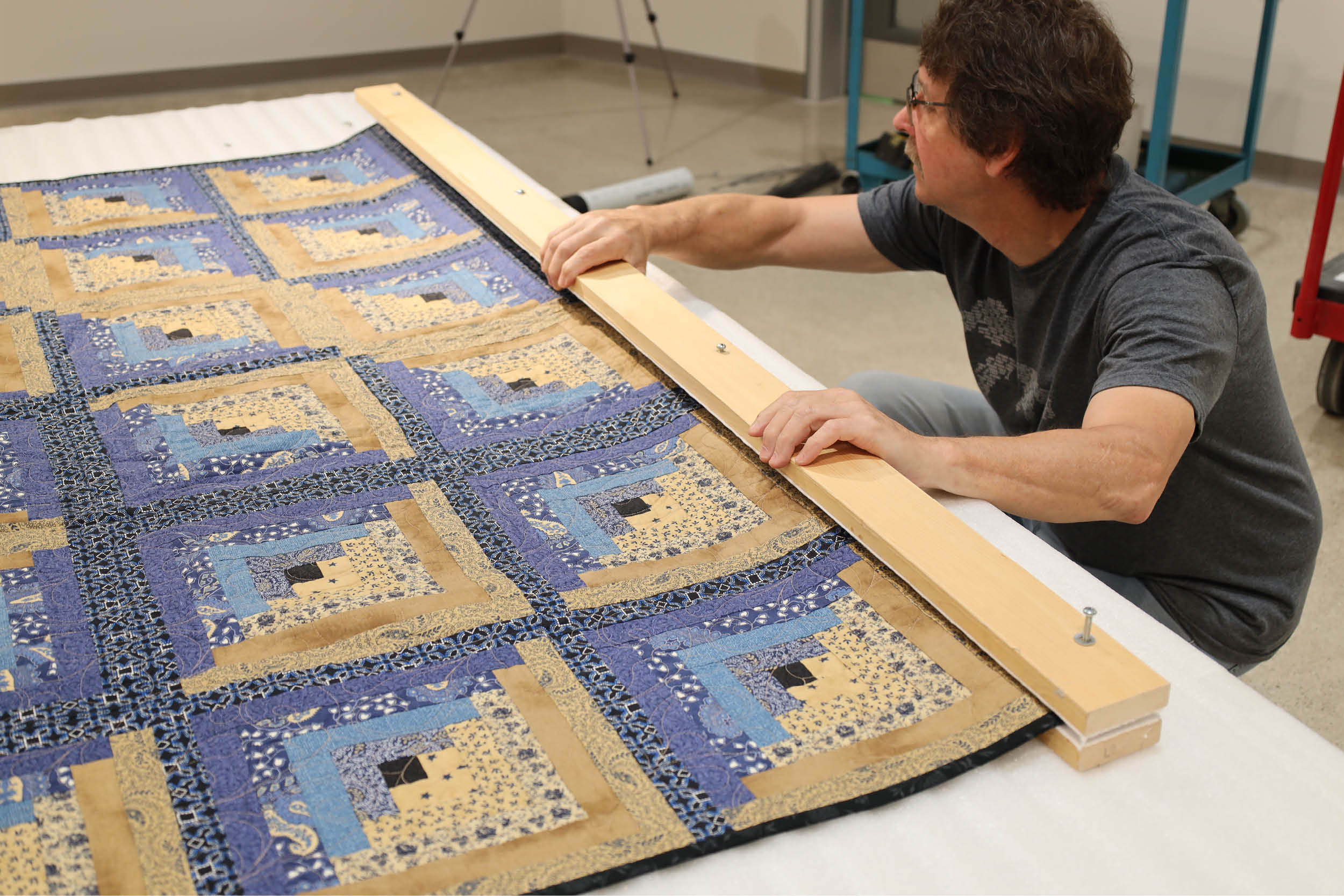Lambton Heritage Museum prepares quilts for hanging in the 2025 North Lambton Quilters' Guild Quilt Show