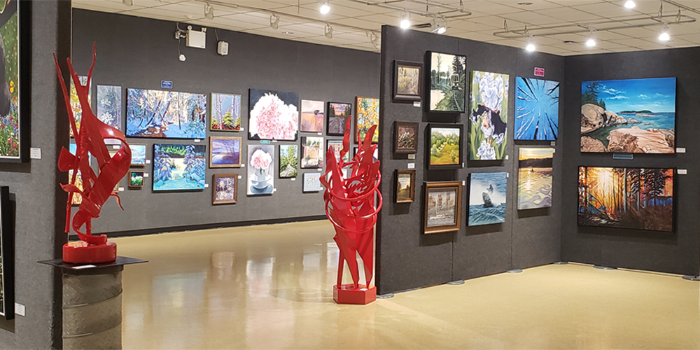 Sculptures and paintings on display.