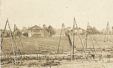 vintage photograph of oil field, sepia tone